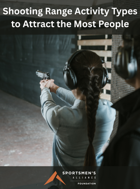 A young woman receives firearm training on handguns at an indoor range