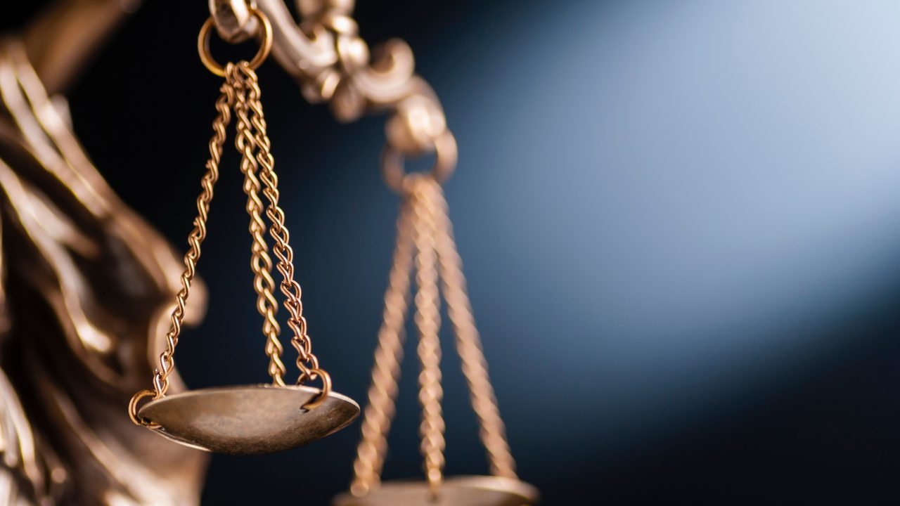 Close up on the scales of justice