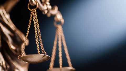 Close up on the scales of justice